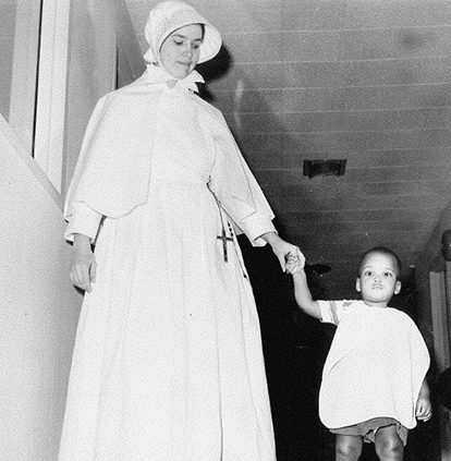 sister with child walking