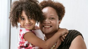 Girl hugging her mom